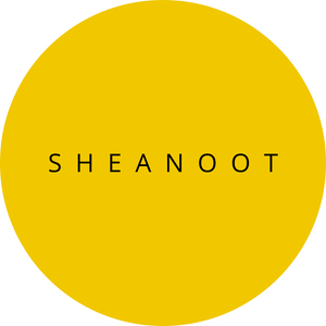 gele sticker met sheanoot erop